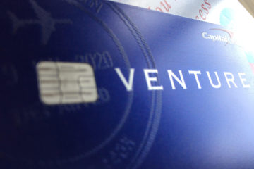 Travel-credit-card-loan-debt-bank-money-treveling-points-miles-plastic-venture-capitol-one